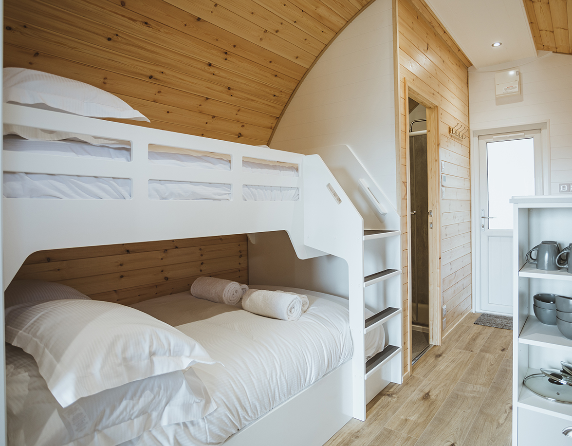 Inside glamping pods bunk beds
